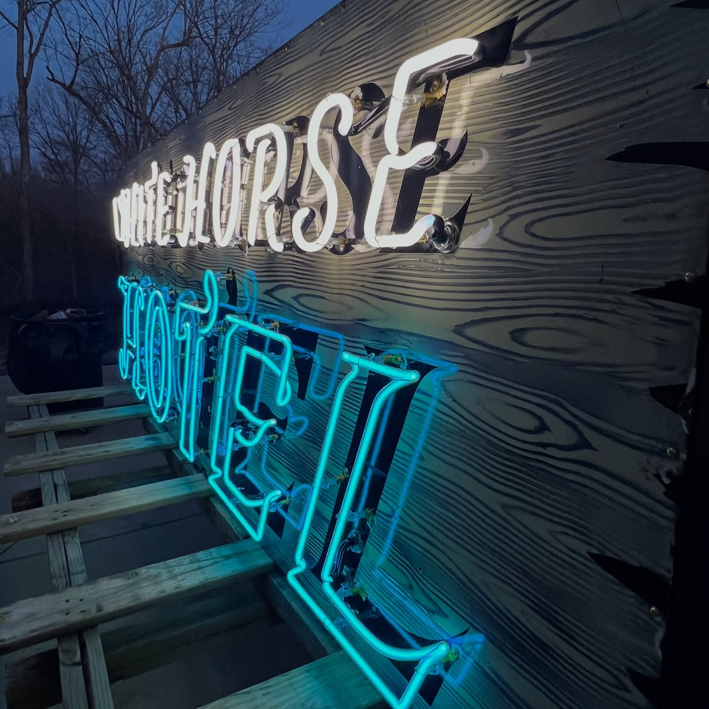 White Horse Hotel neon at night