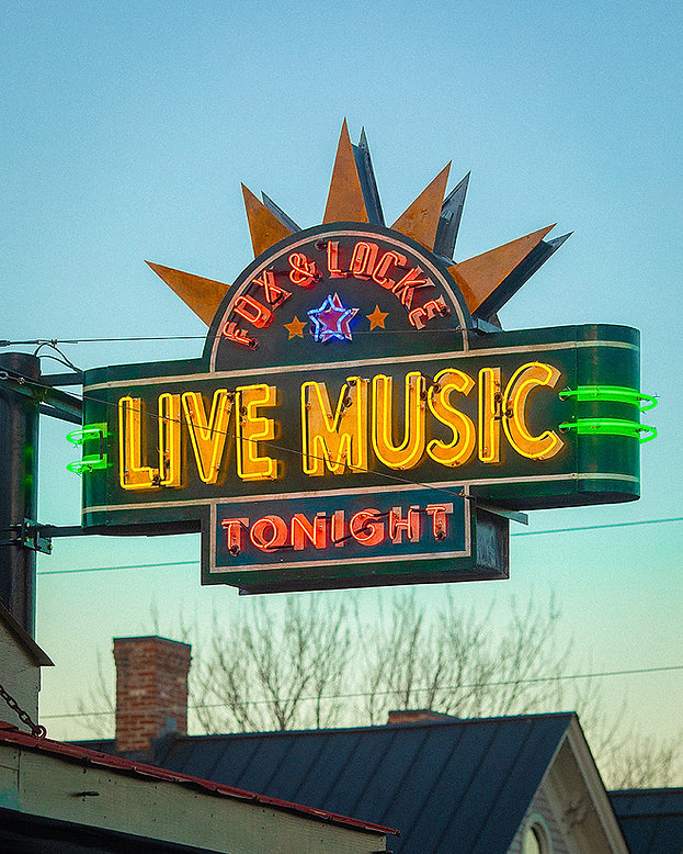 Live Music Tonight neon sign against sky