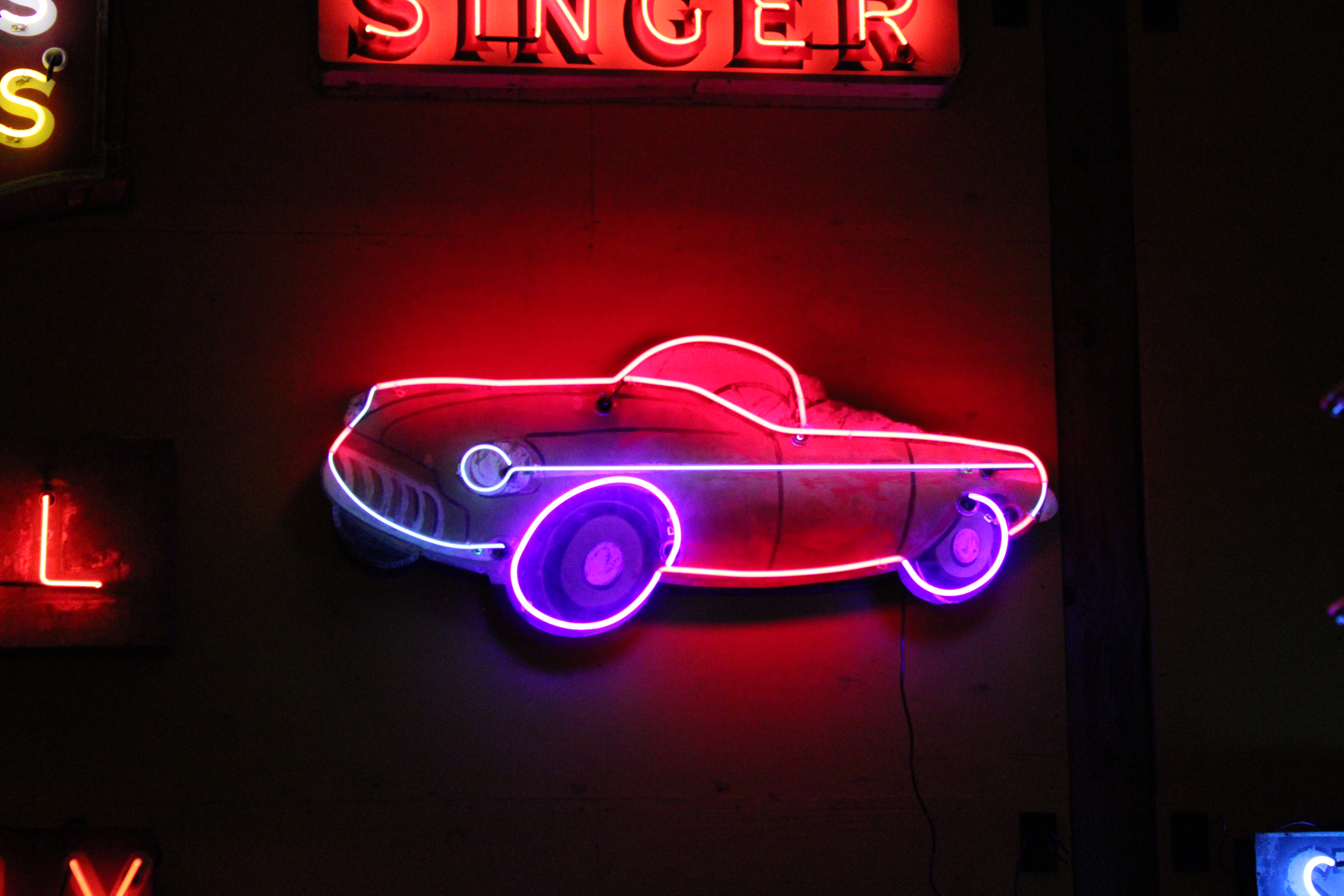 Vintage sports car neon sign